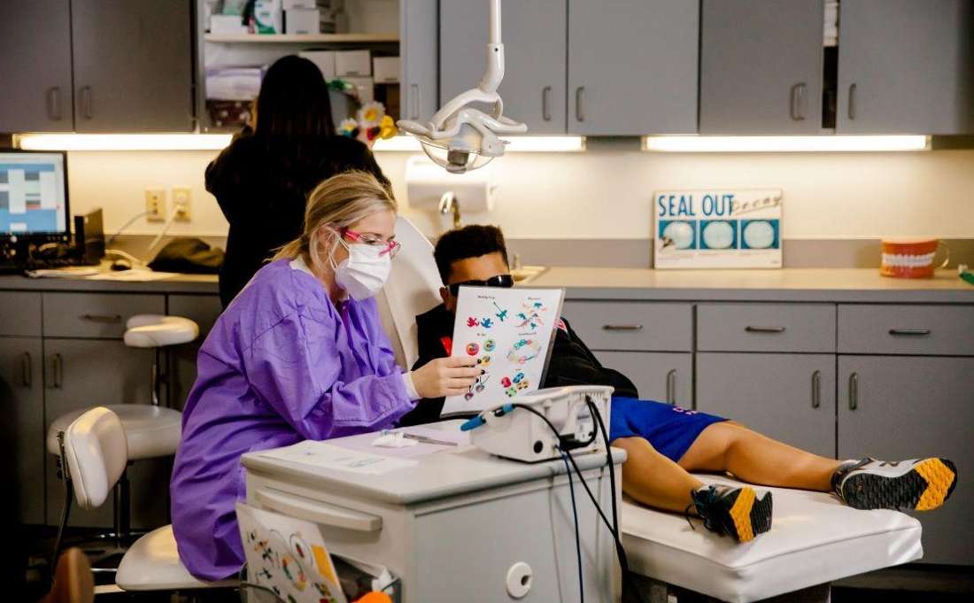 young boy during his teeth cleaning at krewe of smiles in metairie