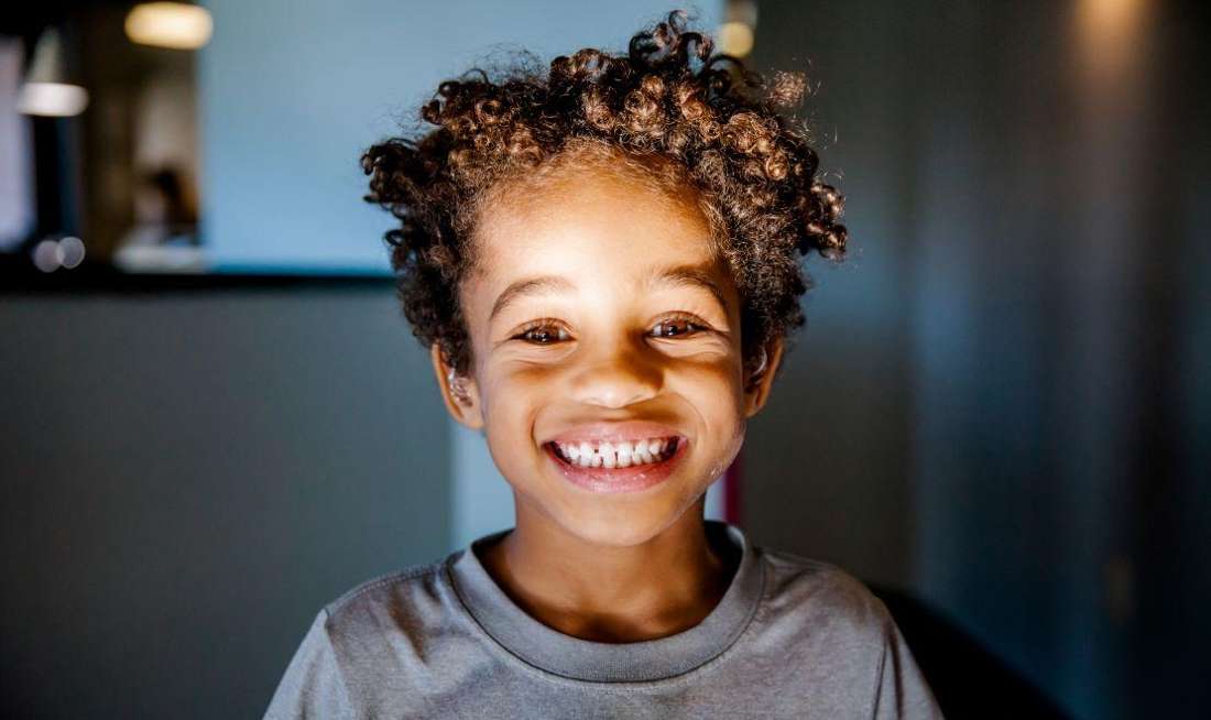 smiling kid at krewe of smiles in metairie la